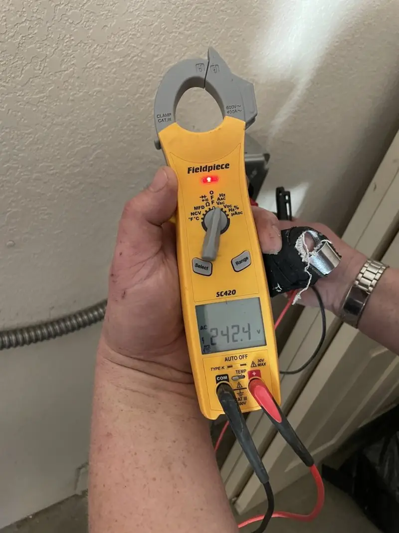 Voltage testing with clamp meter during Aluminum Wiring Replacement in Eureka